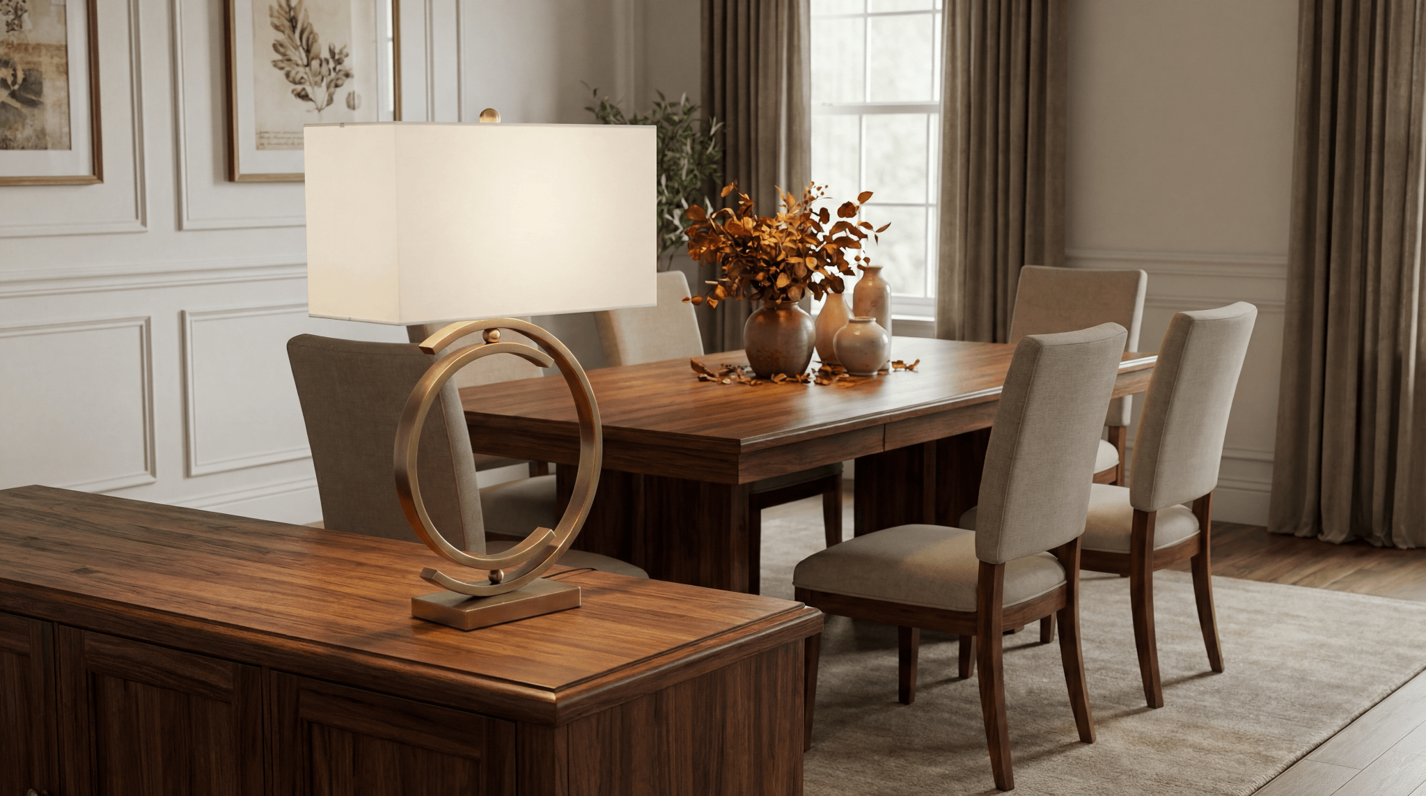 Gold ring base table lamp with rectangular shade on a buffet console in a traditional dining room